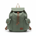 Sage green waxed canvas women's travel backpack on white background